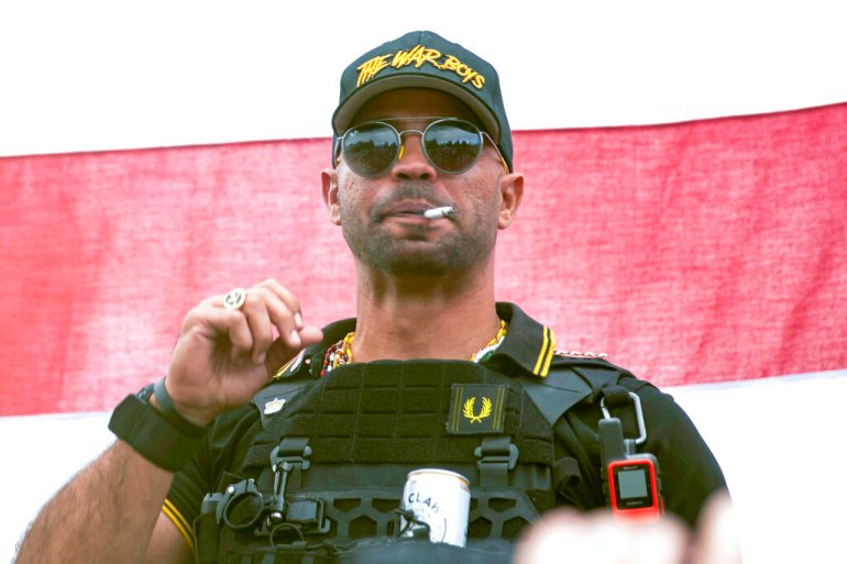 Proud Boys leader Henry "Enrique" Tarrio wears a hat that says The War Boys during a rally in Portland, Oregon.