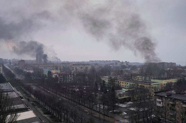 A view of Mariupol as smoke billows from destroyed buildings.