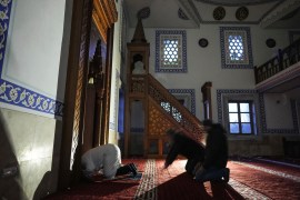 Members of the Ukrainian Turkish diaspora pray in a mosque in Mariupol, Ukraine