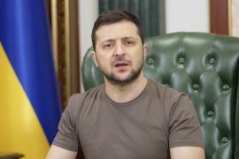 In this image from video provided by the Ukrainian Presidential Press Office and posted on Facebook early Tuesday, March 15, 2022, Ukrainian President Volodymyr Zelenskyy speaks in Kyiv, Ukraine