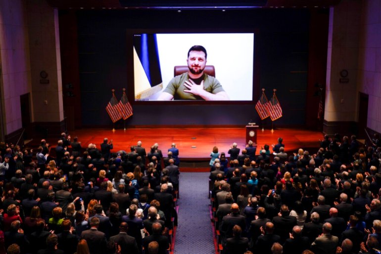Ukrainian President Volodymyr Zelenskyy speaks to the U.S. Congress by video to plead for support as his country is besieged by Russian forces, at the Capitol in Washington, DC.