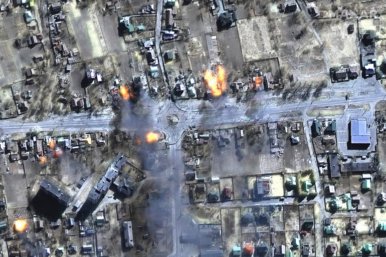 This satellite image provided by Maxar Technologies shows burning buildings in a residential area in northeast Chernihiv, Ukraine on Wednesday, March 16, 2022. (Maxar Technologies via AP)