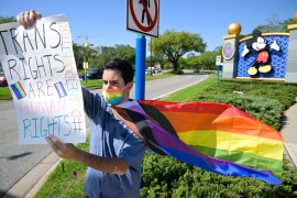 Disney cast member Nicholas Maldonado protests his company's stance on LGBTQ issues, while participating in an employee walkout at Walt Disney World.