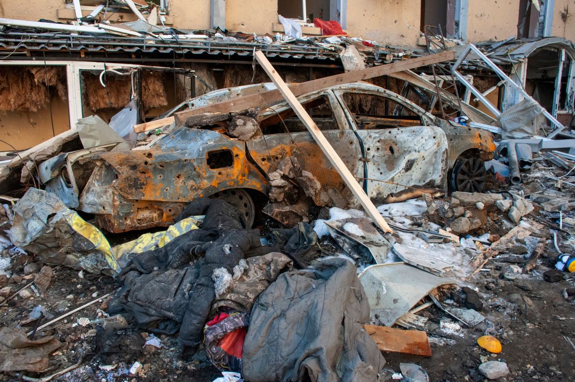 A car destroyed by shelling is seen in a street in Kharkiv,