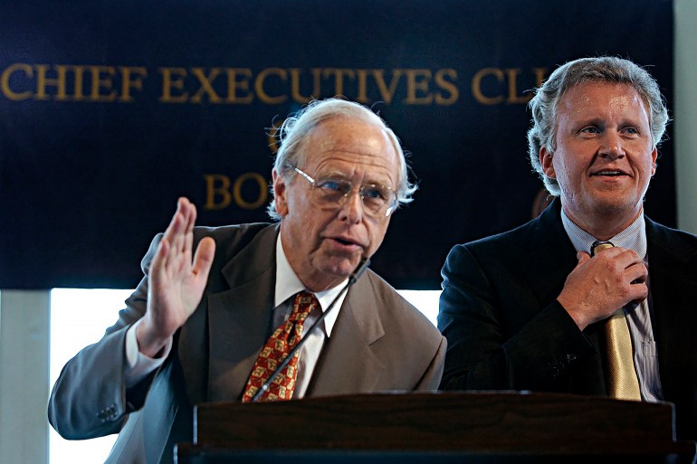 Fidelity Investments chairman & CEO Edward “Ned” Johnson III, left, addresses an audience as General Electric chairman &amp; CEO Jeffrey R. Immelt, right, looks on