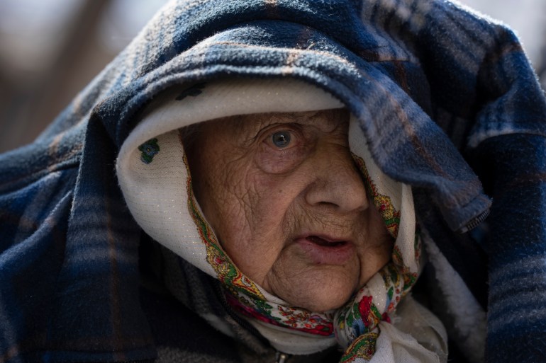 Sofia Boiko, 90, arrives at the Ukrainian Red Cross center in Mykolaiv, southern Ukraine