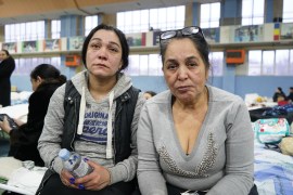 Two Roma refugee women speaking