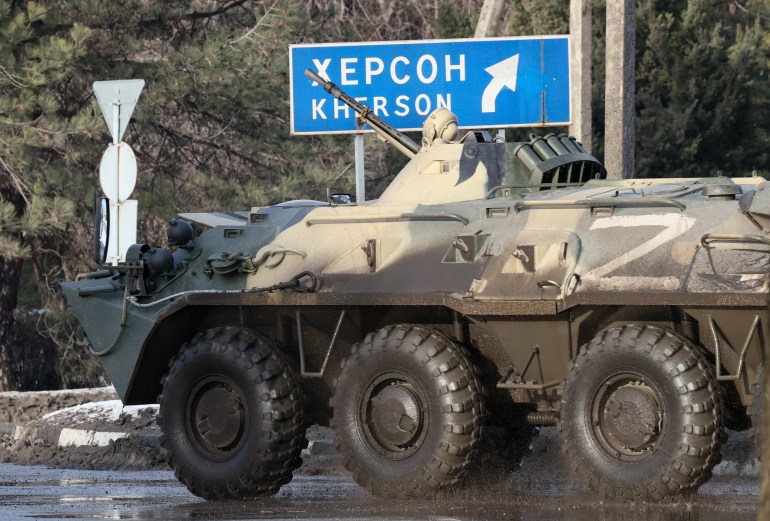 Russian military hardware is seen moving along a street