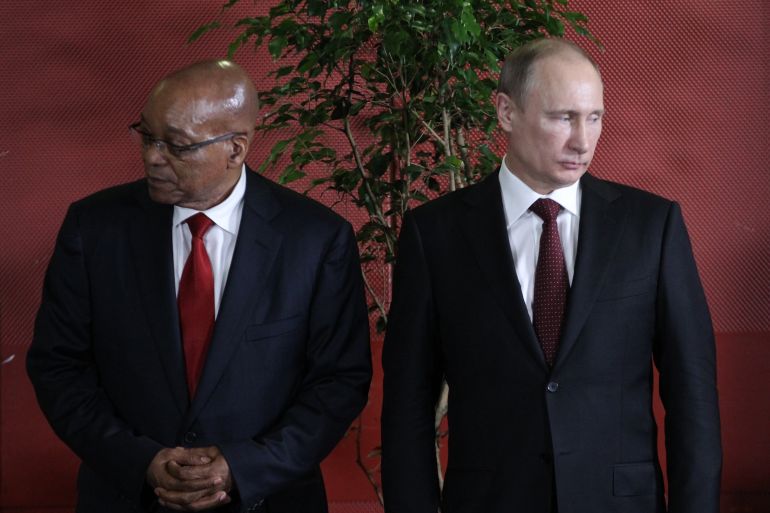 Putin and Zuma are seen at a meeting together in 2013