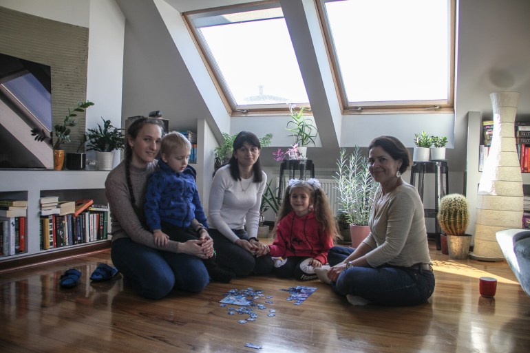 Magdalena Petersen, Katya Nesteruk, Yulia Koval and their children in the flat of Petersen's friend who lives in Germany