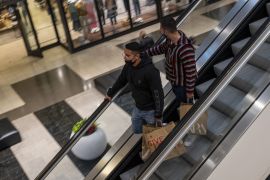Shoppers carry bags inside the Westfield San Francisco Centre shopping mall in San Francisco, California, U.S