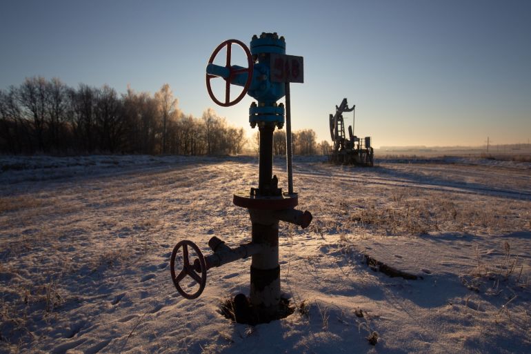 Valve control wheels connected to crude oil pipework in an oilfield near Dyurtyuli, in the Republic of Bashkortostan, Russia