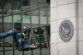 A construction worker outside the U.S. Securities and Exchange Commission headquarters in Washington, D.C., U.S.