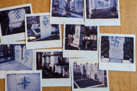 Polaroids showing graffiti desecrating Jewish graves in various cemeteries around England.
