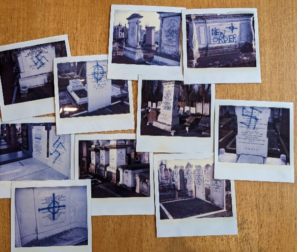 Polaroids showing graffiti desecrating Jewish graves in various cemeteries around England.