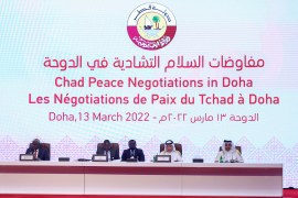 Participants take their seats on the podium as the Chad Peace Negotiations start in Qatar's capital Doha, on March 13