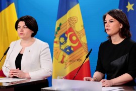 Moldovan Prime Minister Natalia Gavrilita (L) and German Foreign Minister Annalena Baerbock address a press conference