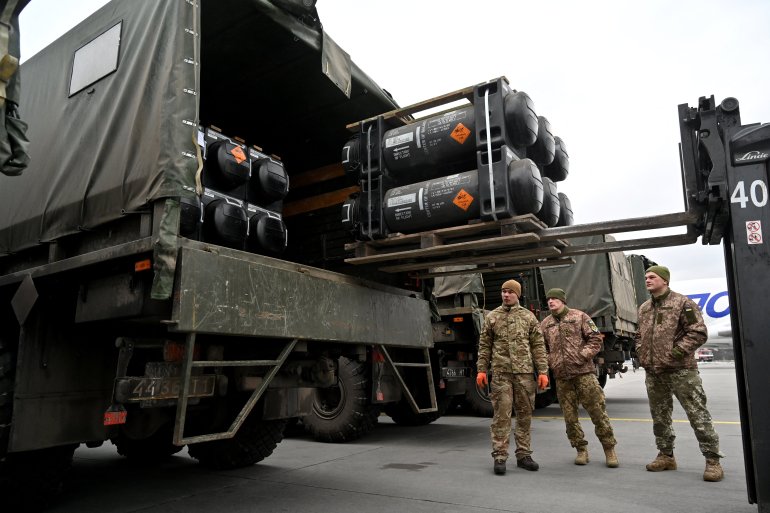Ukrainian servicemen load a truck with the FGM-148 Javelin, an American man-portable anti-tank missile, February 2022