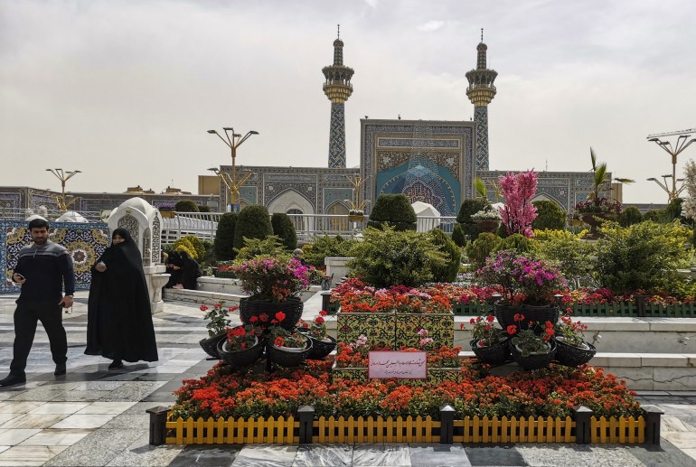 Iranians visit the spot in the courtyard of Imam Reza shrine.