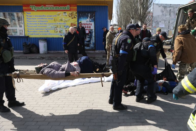 Emergency personel tend to wounded in Kramatorsk in eastern Ukraine on April 8, 2022.