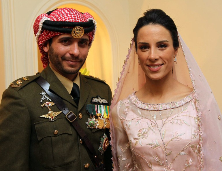 Prince Hamzah stands with his wife Princess Basma Otoum