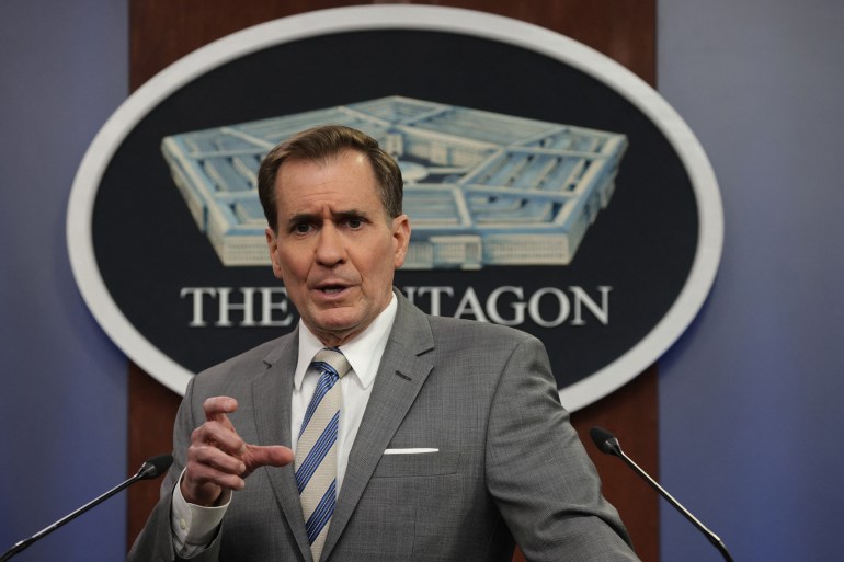 Pentagon spokesman John Kirby speaks at a podium