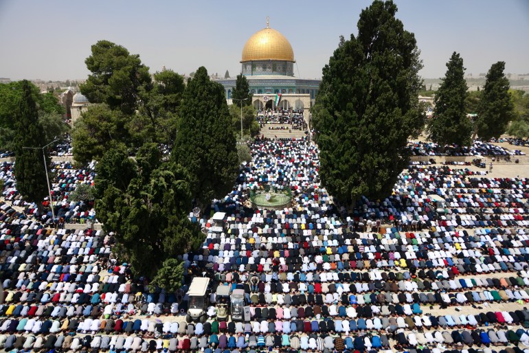 Thousands pray at the Al-Aqsa Mosque compound, occupied East Jersualem