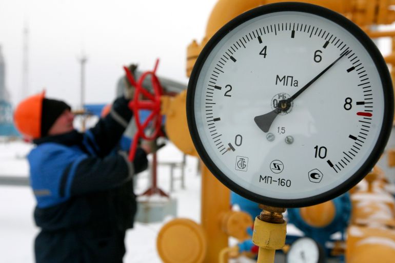 A worker turns a valve at the Nesvizhskaya compressor station in January 9, 2009.