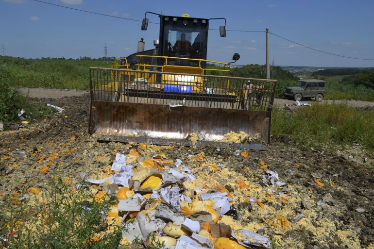 Russian bulldozer destroys cheese