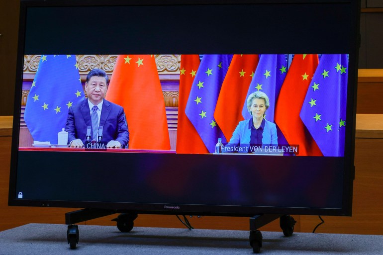 Chinese President Xi Jinping and European Commission President Ursula von der Leyen on screens at the China-EU virtual summit