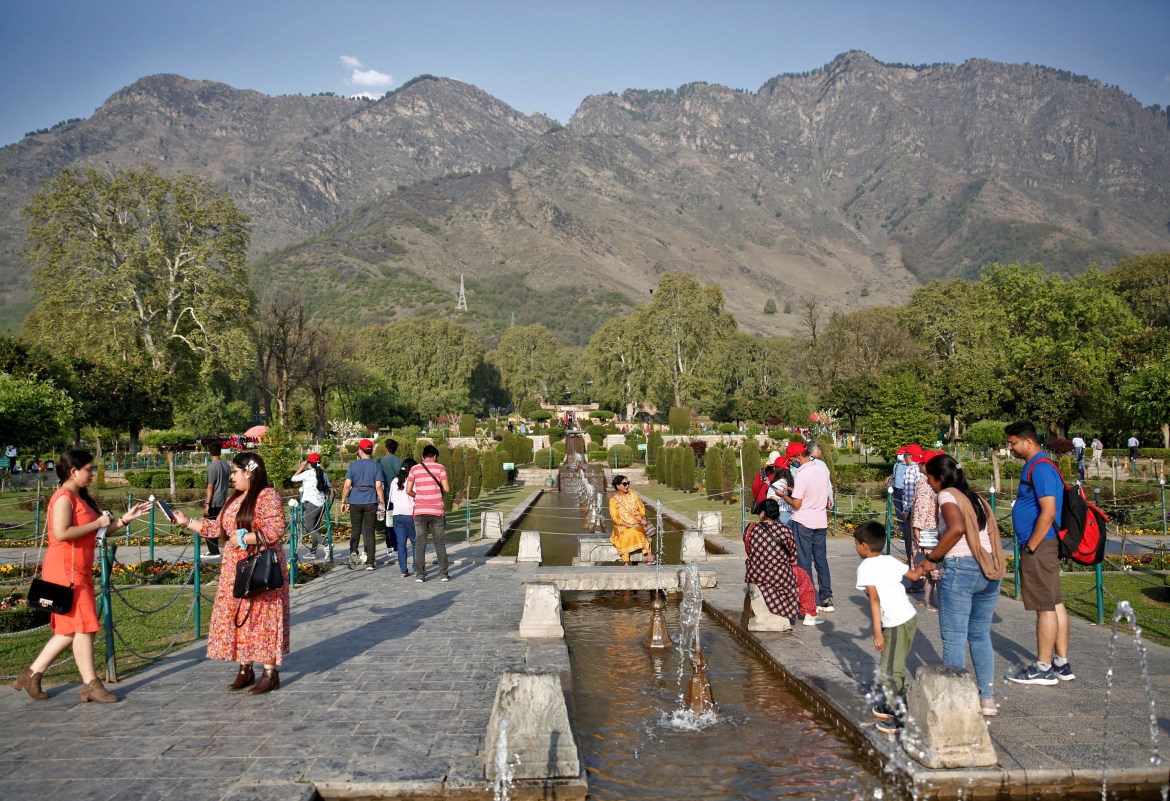 Tourists visit Nishat Garden in Srinaga