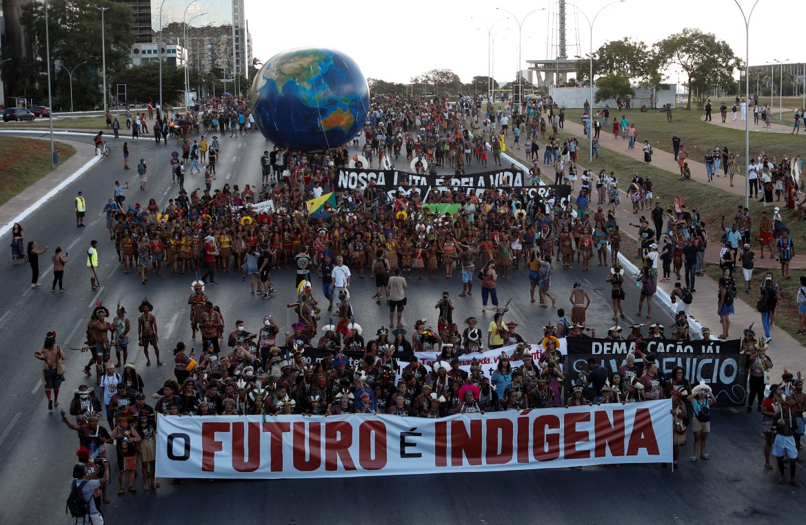 Indigenous people march during a protest against Brazil's President Jair Bolsonaro
