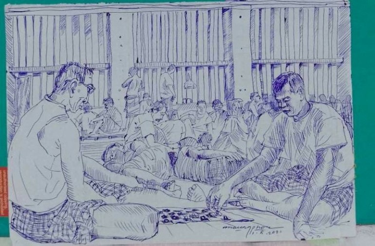a blue ink sketch of inmates sitting, some of them cross-legged, inside a crowded Insein prison cell 
