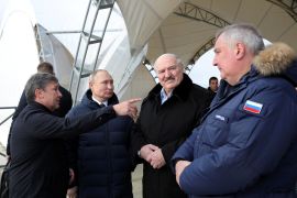 Russian President Vladimir Putin, Belarusian President Alexander Lukashenko and Director General of Roscosmos Dmitry Rogozin visit the construction site of the Amur launch complex for Angara rockets at the Vostochny Cosmodrome in Amur Region, Russia April 12, 2022. Sputnik/Mikhail Klimentyev/Kremlin via REUTERS ATTENTION EDITORS - THIS IMAGE WAS PROVIDED BY A THIRD PARTY.