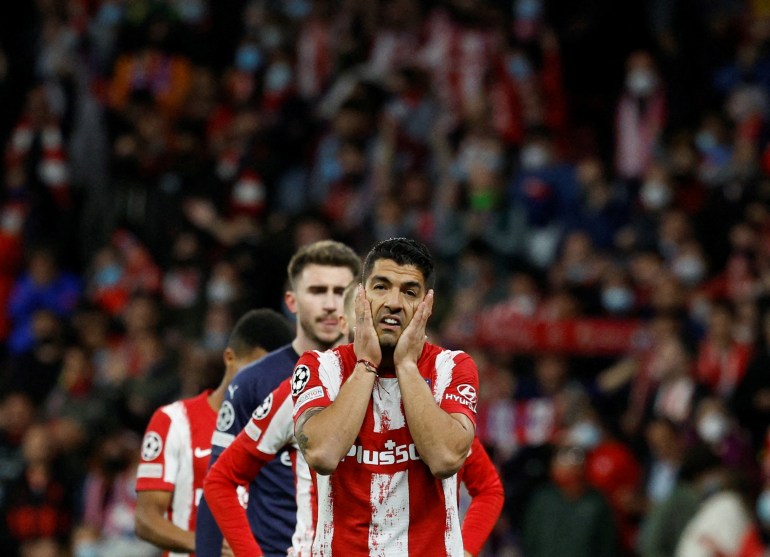Madrid's Luis Suarez looks dejected after the match