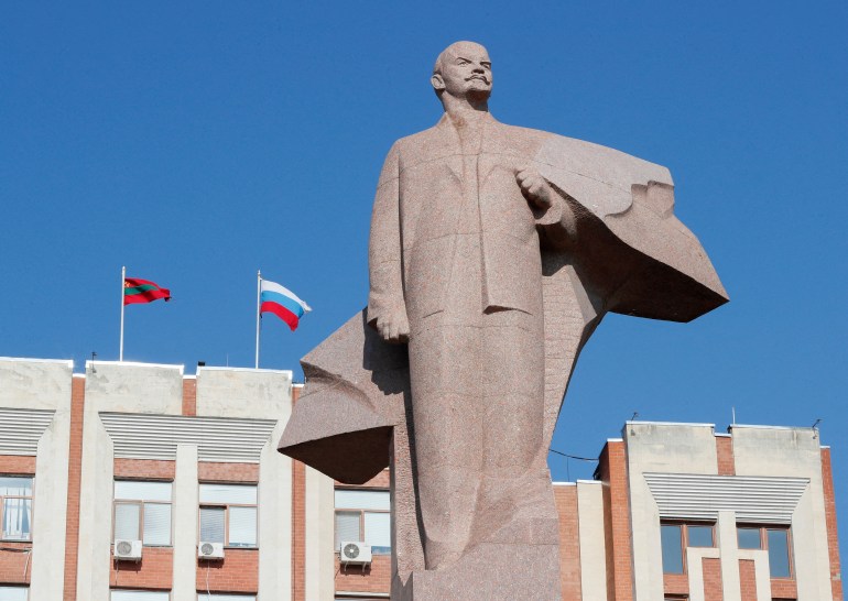 A statue of communist leader Lenin is seen in front of the parliament building in Tiraspol, in Moldova's self-proclaimed separatist Transnistria,