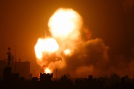 Flames and smoke rise during Israeli air strikes amid a flare-up of Israel-Palestinian violence, in the southern Gaza Strip