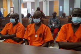 Issa Sallet Adoum, alias Bozize, Ousman Yaouba and Mahamat Tahir, three members of the Central African Republic rebel group the 3R, accused of war crimes and crimes against humanity, wait for their trial at the court in Bangui, Central African Republic