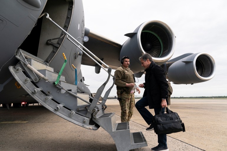 Secretary of State Antony Blinken boards a plane for departure, at Joint Base Andrews, in Maryland, U.S., April 23, 2022.