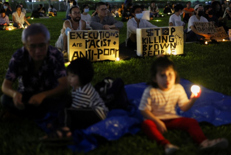 Singaporeans hold a vigil against the death penalty in Hong Lim Park