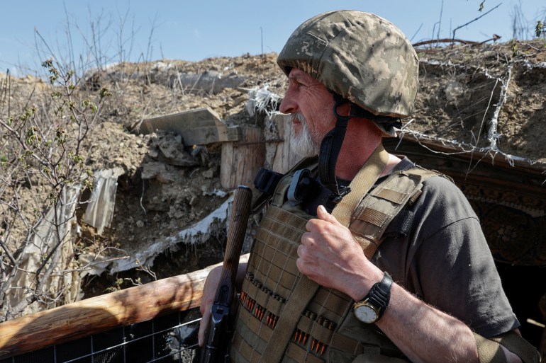 A Ukrainian serviceman looks on at a position, as Russia's attack on Ukraine continues, in Luhansk Region, Ukraine April 26, 2022. REUTERS/Serhii Nuzhnenko