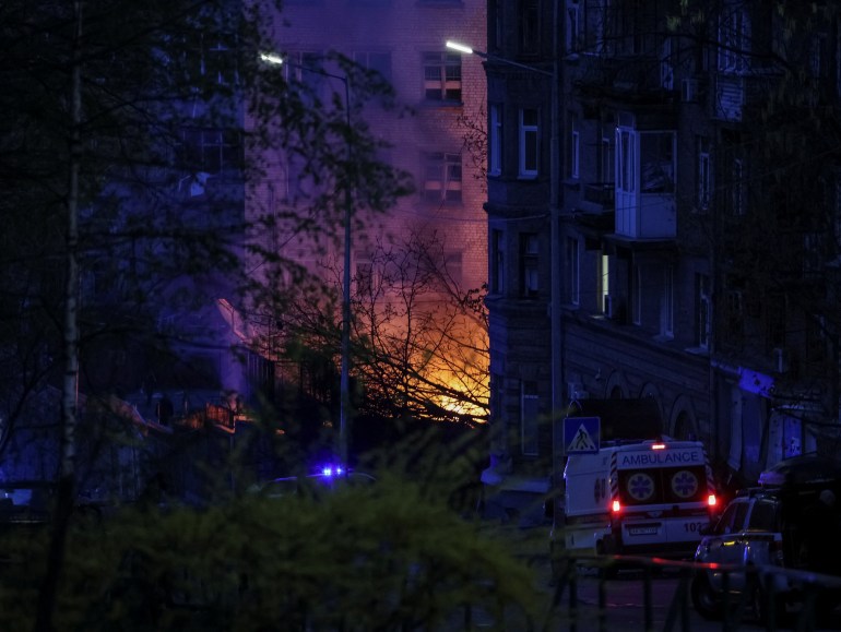 Fire burns in a building after a shelling, amid Russia's invasion of Ukraine, in Kyiv, Ukraine April 28, 2022.