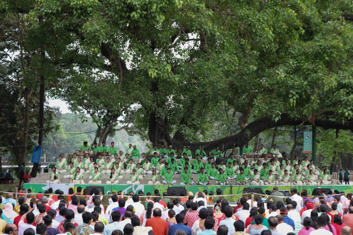 singers from Chhayanaut are performing under the historic Batamul (under the banyan tree)