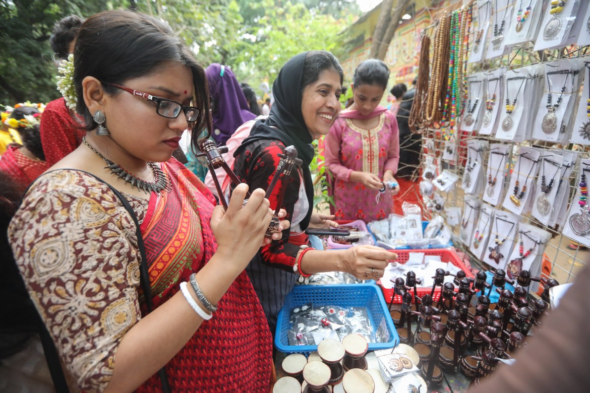 People were seen buying trinket from the makeshift shops set up at the Dhaka University premises on the occasion of Pahela Baishakh