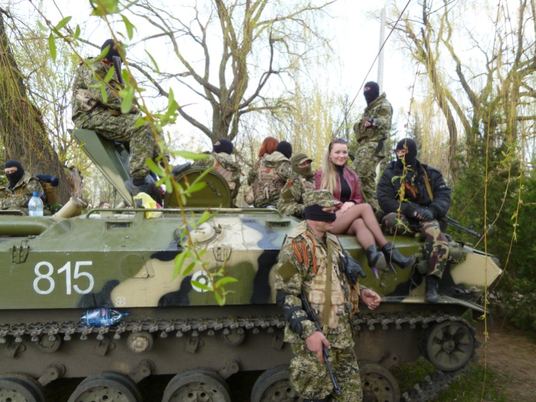 A fan of pro-Russian separatists on a tank