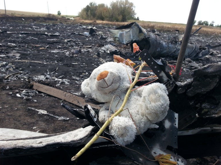 A teddy bear in the debris of the MH17 passenger plane shot down over Donetsk in 2014