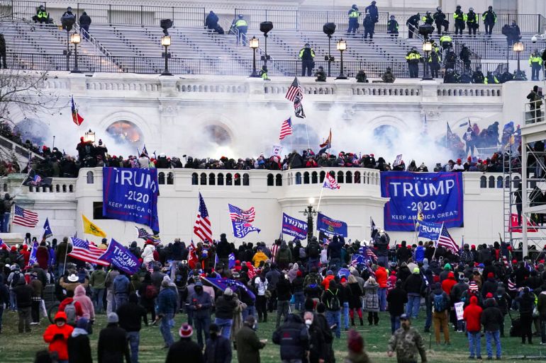 Violent insurrectionists, loyal to President Donald Trump, storm the Capitol in Washington on January 6, 2021.