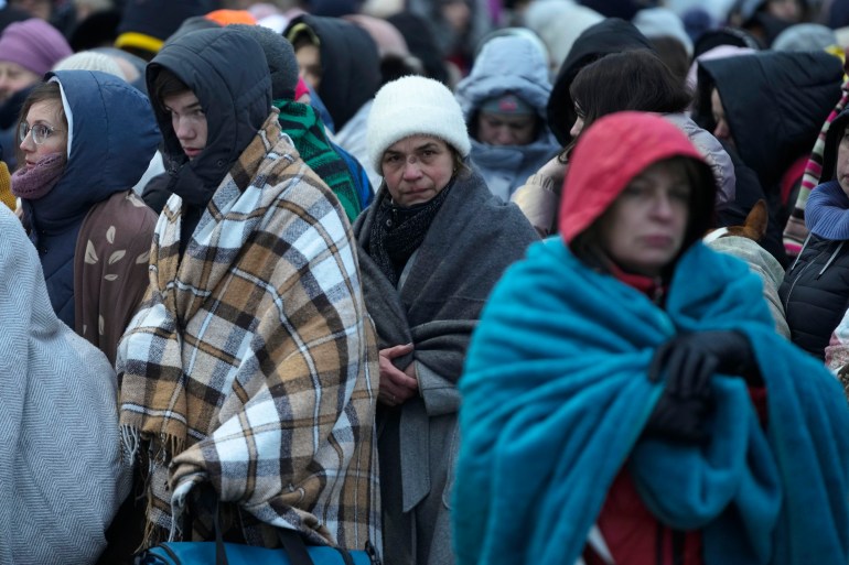 Ukrainian refugees arrive at the border crossing in Medyka, Poland in March 2022