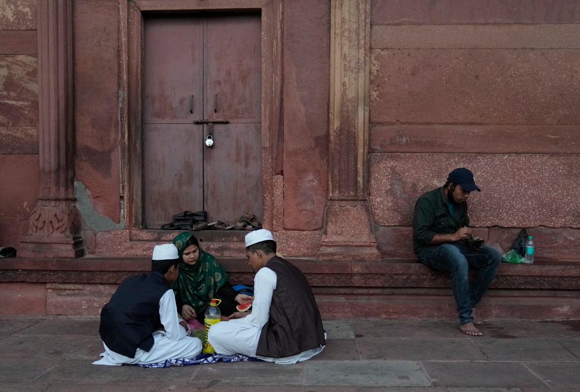 Indian Muslims wait to break their fast