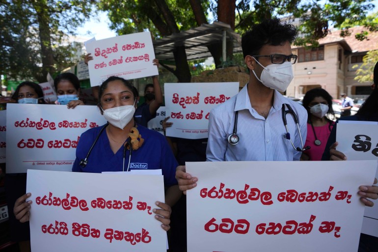 Sri Lankan government doctors protest against the government near the national hospital in Colombo, Sri Lanka, Wednesday, April 6, 2022.